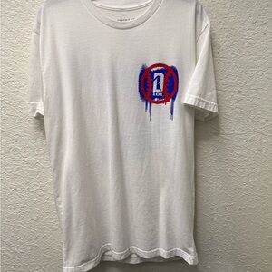 White Graphic Tee with Blue and Red Design